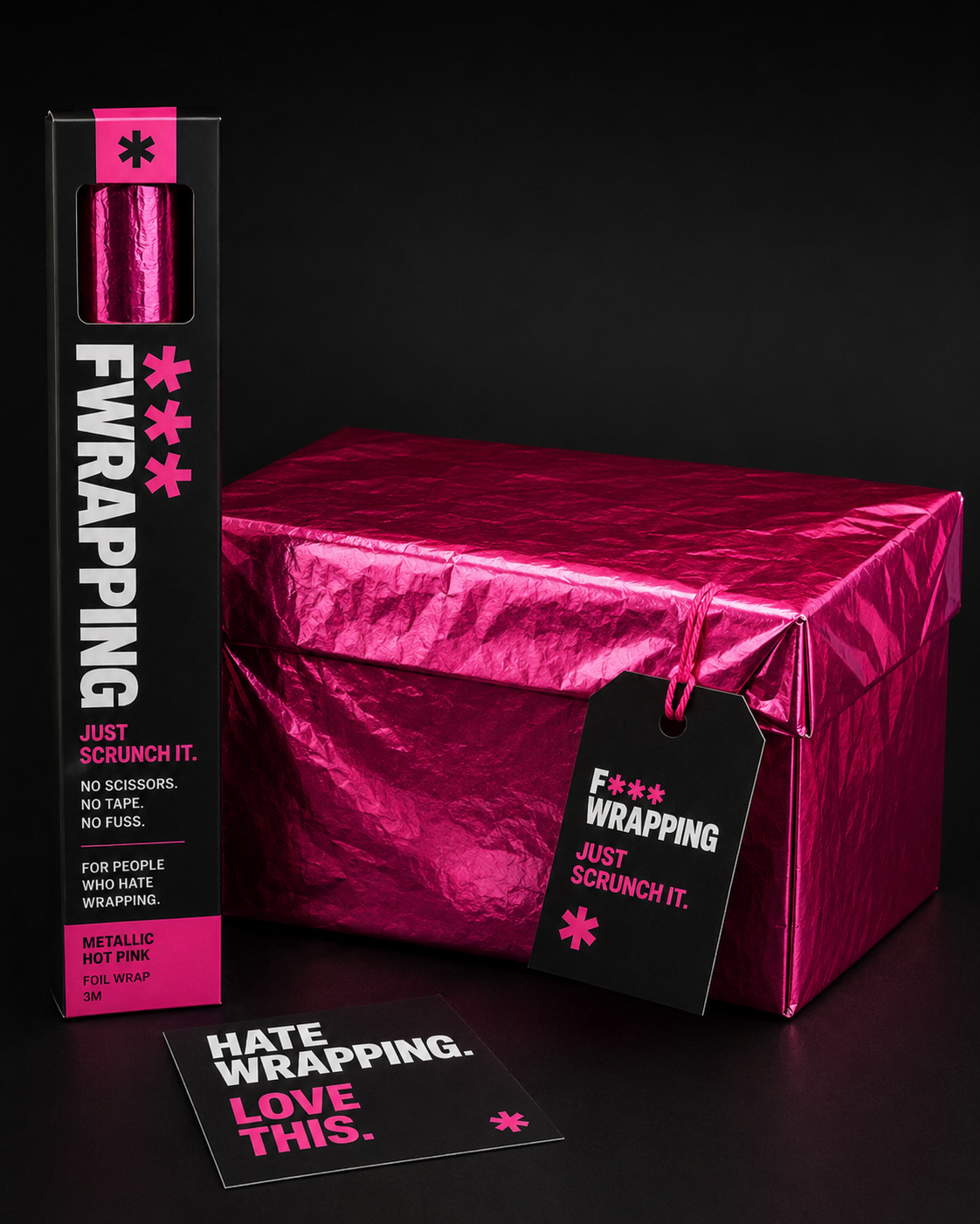 Box-shaped gift wrapped in plain opaque crinkled hot pink foil