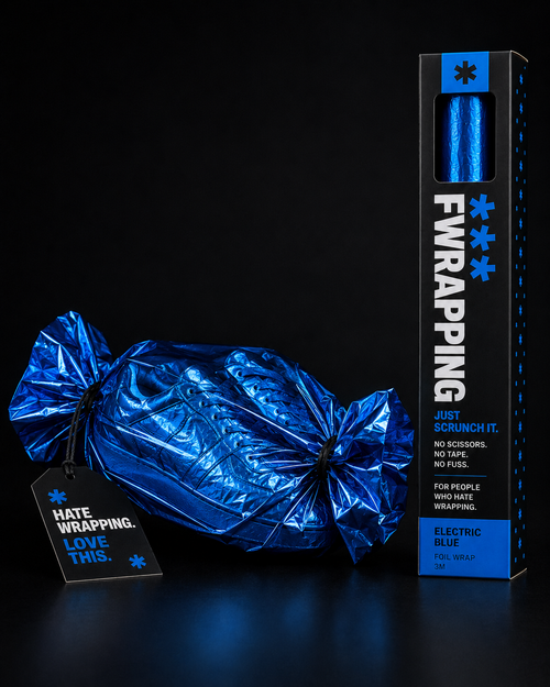 Cracker-shaped gift wrapped in plain opaque crinkled electric blue foil